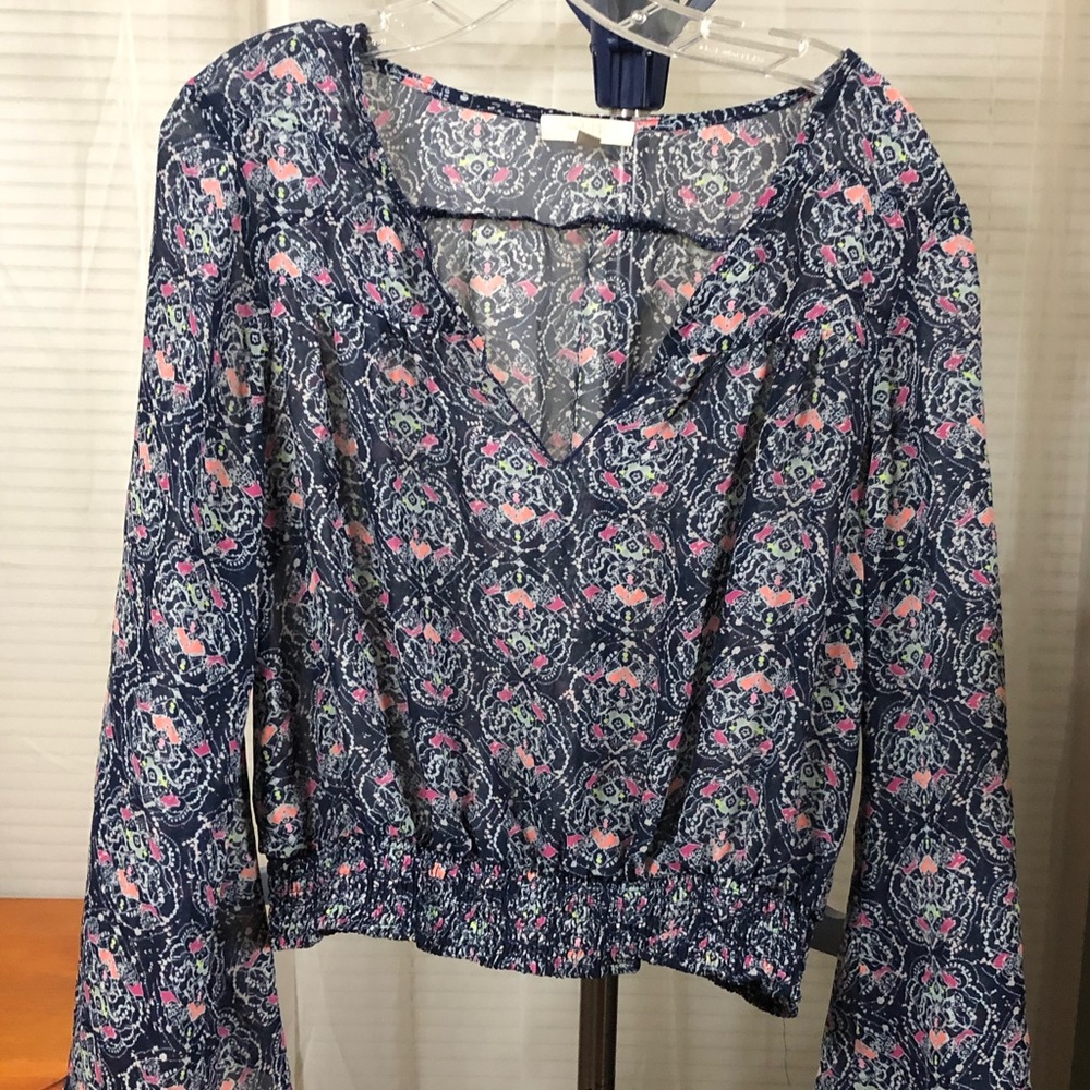 Navy print blouse with elastic band at waist size XL